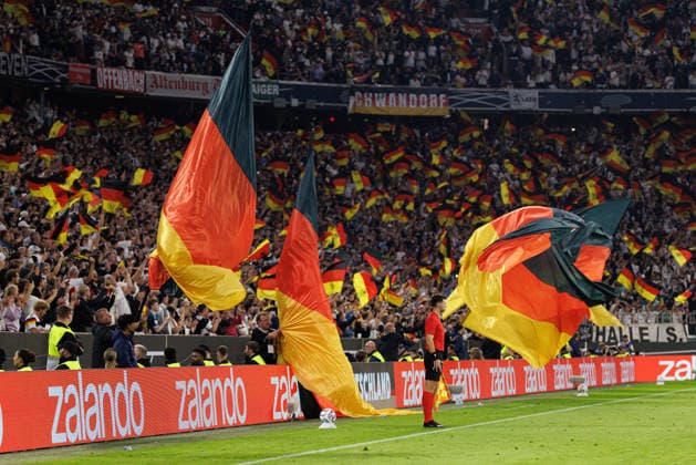 Fans of Team Germany celebrate the 1–0 goal in the match between Germany and Serbia, men s soccer, UEFA Nations League, 2026–2027, Matchday 3 on October 1, 2026, in Munich, Allianz Arena, Bavaria, Germany