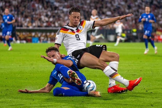 Strahinja Erakovic (SRB) and Derry Scherhant (GER), Germany, Munich, October 1, 2026, Soccer, National Team, Nations League: Germany vs. Serbia, 2026–2027 Season, Matchday 3, Allianz Arena