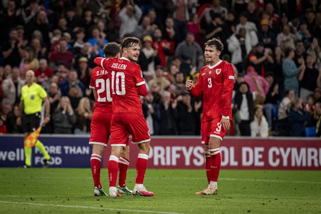 RECORD DATE NOT STATED 1st October 2026; Cardiff City Stadium, Cardiff, Wales; UEFA Nations League Football, Wales versus Norway; Daniel James of Wales celebrates with Liam Cullen and Neco Williams after scoring in the 38th minute to make the score 1-1 GodfreyxPitt