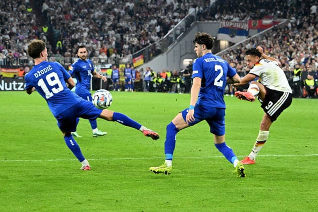 October 1, 2026, xsltx, Soccer UEFA Nations League, Germany vs. Serbia, Stefan Dzodic (Serbia), Kosta Nedeljkovic (Serbia), Derry Scherhant (Germany), German National Soccer Team (DFB), tackle, action, battle for the ball, Munich