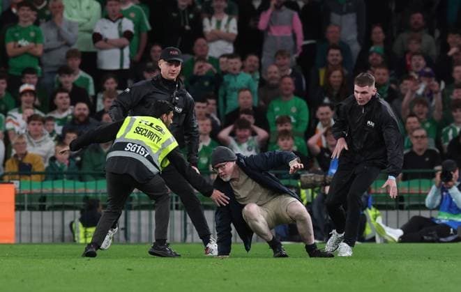 A protestor is removed by security Republic of Ireland v Austria, UEFA Nations League, League B - Group 3, International Football, Aviva Stadium, Dublin, Ireland - 01 Oct 2026Dublin Aviva Stadium Ireland  Copyright: xLorrainexO Sullivan Shutterstockx 17178960av