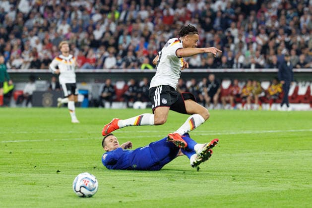 Derry Scherhant 9, Germany, and Nemanja Maksimovic 5, Serbia, in the match between Germany and Serbia, soccer, men s, UEFA Nations League, 2026–2027, Matchday 3 on October 1, 2026, in Munich, Allianz Arena, Bavaria, Germany