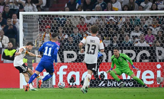 GOAL for 2-0: Florian Wirtz (GER, 17) against goalkeeper Djordje Petrovic (SER, 01) – DFB International Match: Germany (GER) vs. Serbia (SER), UEFA Nations League on October 1, 2026. DFL regulations prohibit any use of photographs as imGE SEQUENCES AND OR QUASI-VIDEO DFB International Match: Germany (GER) vs. Serbia (SER), UEFA Nations League