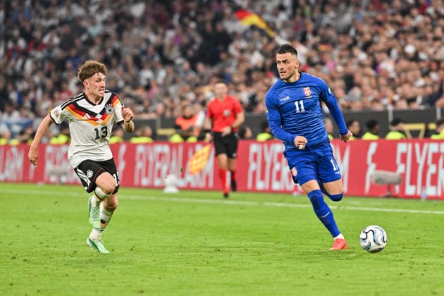 MUNICH, GERMANY; 01. OCTOBER: tackle between Philipp TREU (Germany 13) and Filip KOSTIC (Serbia 11) during the UEFA Nations League Match between Germany vs. Serbia at Matchday 3 at Allianz Arena Copyright: xBEAUTIFULxSPORTS Goldbergx