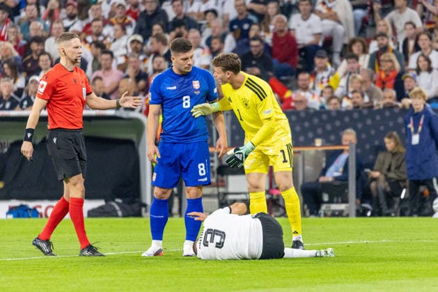 Soccer: UEFA Nations League 2026–2027, Matchday 3: Germany vs. Serbia at the Allianz Arena in Munich; Waldemar Anton of Germany, No. 3, injured on the ground Copyright: xMichellexLukax