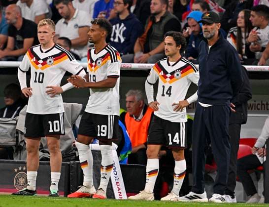 October 1, 2026, Soccer: 2026–2027 UEFA Nations League, Matchday 3, Germany vs. Serbia, at the Allianz Arena in Munich: Jonathan Burkardt (Germany), Bambase Conte (Germany), and Mika Baur (Germany), along with national team coach Jürgen Klopp (Germany)