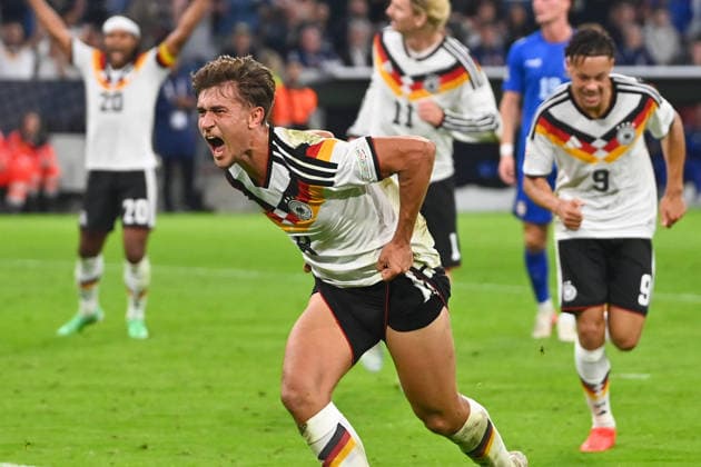 Goal celebration: Tom BISCHOF (GER) after scoring the 1-0 goal, Celebration, Joy, Excitement, Action, Single Frame, Cropped Single Subject, Half-Figure, Half-Figure Soccer Nations League Group Stage, Group B, Matchday 3 Germany (GER) vs. Serbia (SRB) 2–0 on October 1, 2026, ALLIANZ ARENA