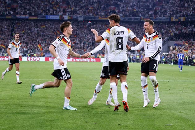 WIRTZ, Florian, of Team Germany, celebrates after scoring the goal that made the score 2–0, alongside BISCHOF, Tom. UEFA Nations League 2026–2027 season, Germany vs. Serbia, 2–0, October 1, 2026, Munich. DFL regulations prohibit any use of photographsRAPHS as IMAGE SEQUENCES and or QUASI-VIDEO Copyright: xLacixPerenyix
