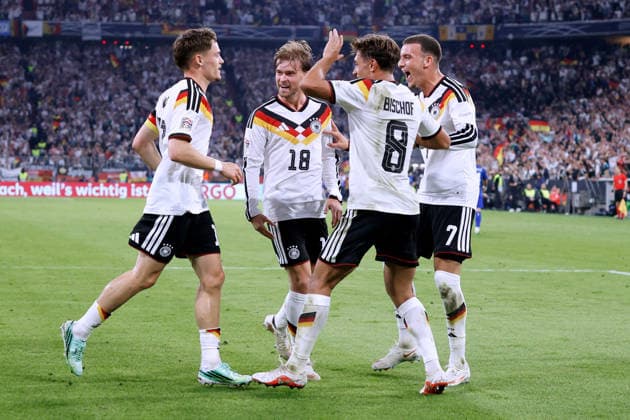 WIRTZ, Florian, of Team Germany, celebrates after scoring the goal that made the score 2–0, alongside BISCHOF, Tom. UEFA Nations League 2026–2027 season, Germany vs. Serbia, 2–0, October 1, 2026, Munich. DFL regulations prohibit any use of photographsRAPHS as IMAGE SEQUENCES and or QUASI-VIDEO Copyright: xLacixPerenyix