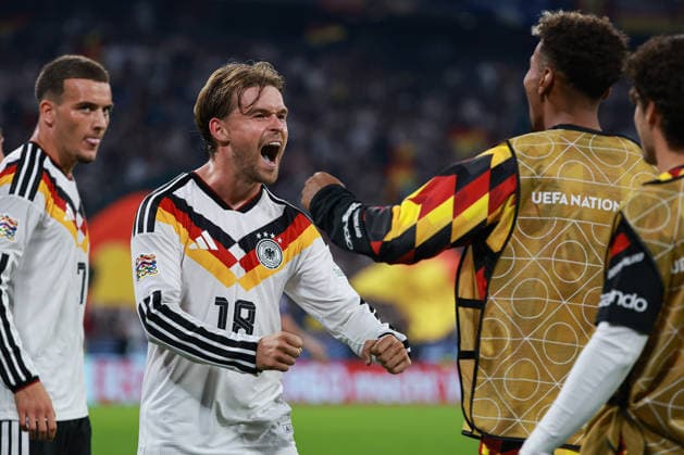 UEFA Nations League Match 26 vs. 27: Germany vs. Serbia on October 1, 2026, at the Allianz Arena in Munich. Maximilian Mittelstädt (Germany, 18) celebrates joyfully after Florian Wirtz (Germany, 17, not pictured) scores the goal to make it 2–0. MH