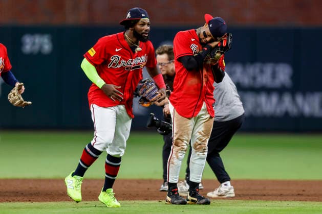 Atlanta Braves center fielder Michael Harris II (23) and Atlanta Braves right fielder Ronald Acuna Jr. (13) celebrate after defeating the Philadelphia Phillies in game three of the MLB, Baseball Herren, USA National League Wild Card round at Truist Park in Atlanta, Georgia on Thursday, October 1, 2026.  ATL20261001341 MIKExZARRILLI