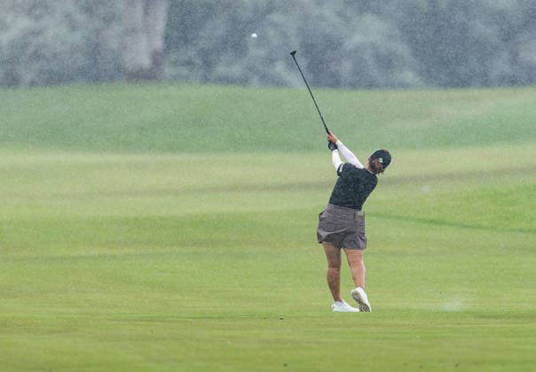 October 1, 2026, Honolulu, Hawaii, USA: JIWON JEON makes an approach shot on the 6th fairway in the rain at the 2026 Lotte Championship at Hoakalei Country Club, Ewa Beach, Hawaii, USA. Even though Hurricane Nolo had already passed Hawaii, its outer bands dropped bouts of heavy rain during Round 1. Honolulu USA - ZUMAm310 20261001_zsp_m310_017 Copyright: xElliotxMilesx