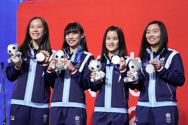 (261002) -- NAGOYA, Oct. 2, 2026 -- Silver medalist team Hong Kong of China poses during the awarding ceremony for the Women s Team of Squash at the 20th Asian Games Aichi-Nagoya 2026 in Nagoya, Japan, Oct. 2, 2026. ) (SP)JAPAN-NAGOYA-ASIAN GAMES-SQUASH-WOMEN S TEAM JiaxYuchen 