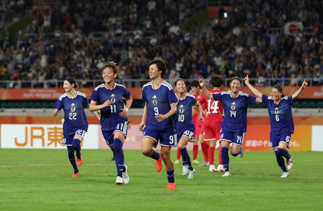 (261002) -- FUKUROI, Oct. 2, 2026 -- Players of Japan celebrate scoring during the women s final match of football between Japan and the Democratic People s Republic of Korea (DPRK) at 20th Asian Games Aichi-Nagoya 2026 in Fukuroi of Shizuoka Prefecture, Japan, Oct. 2, 2026. ) (SP)JAPAN-FUKUROI-ASIAN GAMES-FOOTBALL-WOMEN FINAL-PRK VS JPN JiaxHaocheng 