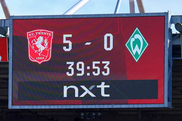 After 40 minutes, the scoreboard shows FC Twente Enschede leading 5–0 against Werder Bremen during the friendly match between FC Twente Enschede and Werder Bremen at De Grolsch Veste on October 2, 2026, in Enschede, Netherlands. Photo by Marco Steinbrenner, DeFodi Images. After 40 minutes, the scoreboard shows FC Twente Enschede leading 5–0 against Werder Bremen during the friendly match between FC Twente Enschede and Werder Bremen at De Grolsch Veste on October 2, 2026, in Enschede, Netherlands. Photo by Marco Steinbrenner, DeFodi Images. Photo by Marco Steinbrenner, DeFodi Images.