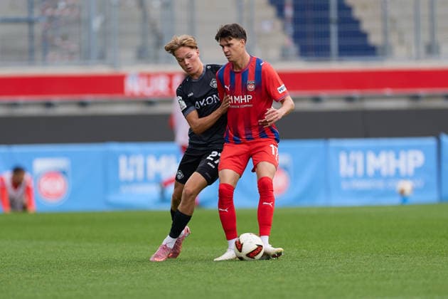 Head-to-head matchup between Xaver Kiefersauer (FC Wuerzburger Kickers, 27) and Mathias Honsak (1 FC Heidenheim, 17, GER), 1 FC Heidenheim 1846 e.V. vs. FC Würzburger Kickers, soccer, men’s friendly matches, 2026–2027 season, October 2, 2026, GER, 1 FC Heidenheim 1846 e.V. vs. FC Würzburger Kickers, soccer, men’s friendly matches, 2026–2027 season, October 2, 2026, Heidenheim an der Brenz Copyright: xEibner-Pressefoto GeraldxOelze-dexStoppanyx EP_ODS