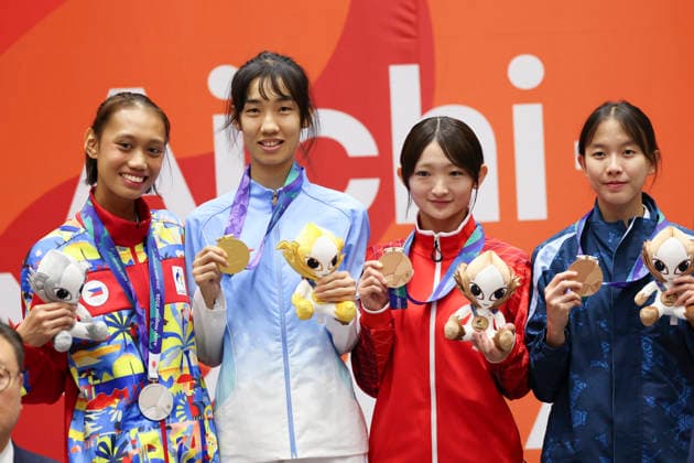 (261002) -- TOYOHASHI, Oct. 2, 2026 -- Gold medalist China s Ma Jingyue (2nd L), silver medalist Tachiana Keizha Mangin of the Philippines (1st L), bronze medalist Japan s Okamoto Ruka (2nd R) and Thailand s Patcharakan Poolkerd pose during the awarding ceremony for the women -49kg of taekwondo at the 20th Asian Games Aichi-Nagoya 2026 in Toyohashi of Aichi Prefecture, Japan, Oct. 2, 2026. ) (SP)JAPAN-TOYOHASHI-ASIAN GAMES-TAEKWONDO-WOMEN -49KG WangxFei 