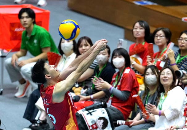 (261002) -- OKAZAKI, Oct. 2, 2026 -- Qu Zongshuai (front) of China saves the ball during the men s volleyball semifinal match between China and Japan at the 20th Asian Games Aichi-Nagoya 2026 in Okazaki of Aichi Prefecture, Japan, Oct. 2, 2026. ) (SP)JAPAN-OKAZAKI-ASIAN GAMES-VOLLEYBALL-MEN-SEMIFINAL-JPN VS CHN CheongxKamxKa 