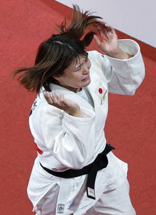 Aichi-Nagoya Asian Games: Judo Japan s Mizuki Sugimura reacts after beating Kim Min Ju of South Korea in the Aichi-Nagoya Asian Games women s judo 78-kilogram final at Aichi International Arena in Nagoya, central Japan, on Oct. 2, 2026.  A14AA0005629772P
