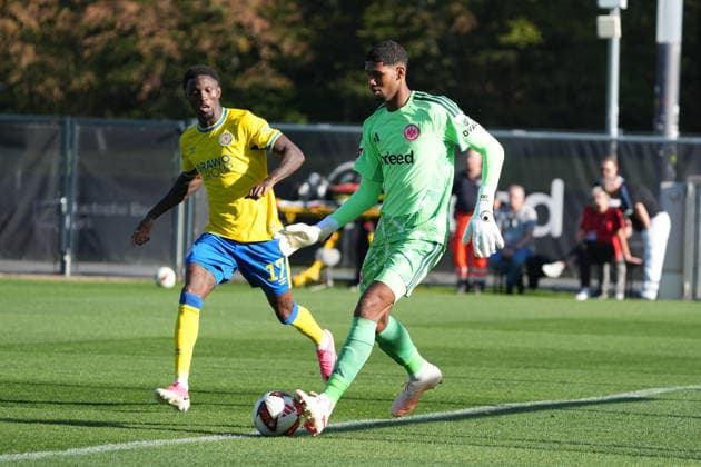Goalkeeper Kaua Santos (Eintracht Frankfurt) vs. Aaron Opoku (Eintracht Braunschweig), February 17, 2026, Bundesliga, Season 26–27, Eintracht Frankfurt vs. Eintracht Braunschweig, Deutsche Bank Park, Training Field, Friendly Match