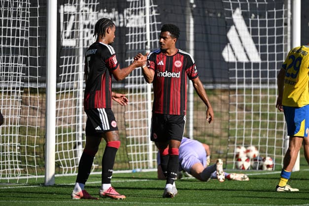 October 2, 2026, xjhx, soccer friendly, Eintracht Frankfurt vs. Eintracht Braunschweig; from left: Otavio (Eintracht Frankfurt), Ansgar Knauff (Eintracht Frankfurt) celebrating the goal; the goal celebration for the 1-0 win in Frankfurt am Main