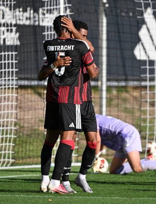 October 2, 2026, xjhx, soccer friendly, Eintracht Frankfurt vs. Eintracht Braunschweig; from left: Otavio (Eintracht Frankfurt), Ansgar Knauff (Eintracht Frankfurt) celebrating the goal; the goal celebration for the 1-0 win in Frankfurt am Main