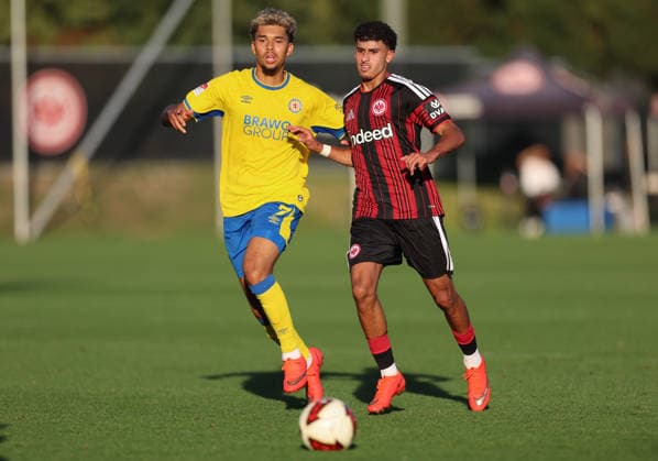 October 2, 2026, Soccer Friendly Match, Eintracht Frankfurt vs. Eintracht Braunschweig, from left to right, Yann Sturm, Eintracht Braunschweig; Ayoube Amaimouni Echghouyab, Eintracht Frankfurt. DFL and DFB regulations prohibit any use of photographs as image sequences and or quasi-video. xdcx Copyright: HMBxMedia Claus