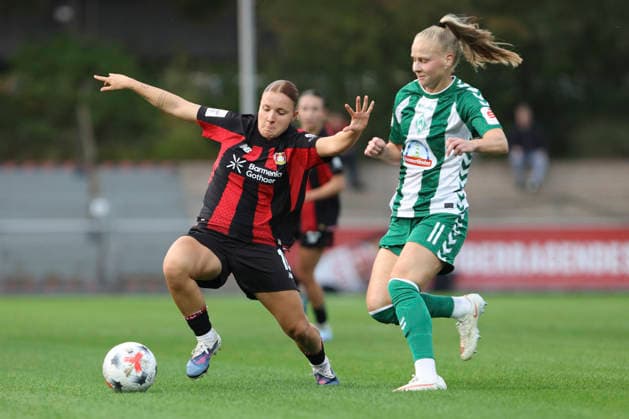 Sofie Zdebel of Bayer 04 Leverkusen and Isabella Jaron of SV Werder Bremen battle for the ball during the Women s Bundesliga match between Bayer 04 Leverkusen and SV Werder Bremen at Ulrich Haberland Stadium on October 2, 2026, in Leverkusen, Germany. Photo by Oliver Kaelke, DeFodi Images. Sofie Zdebel of Bayer 04 Leverkusen and Isabella Jaron of SV Werder Bremen battle for the ball during the Bundesliga match between Bayer 04 Leverkusen and SV Werder Bremen at Ulrich Haberland Stadium on October 2, 2026 in Leverkusen, Germany. Photo by Oliver Kaelke, DeFodi Images. DFB and DFL regulations prohibit any use of photographs as image sequences and or quasi-video. Photo by Oliver Kaelke, DeFodi Images.