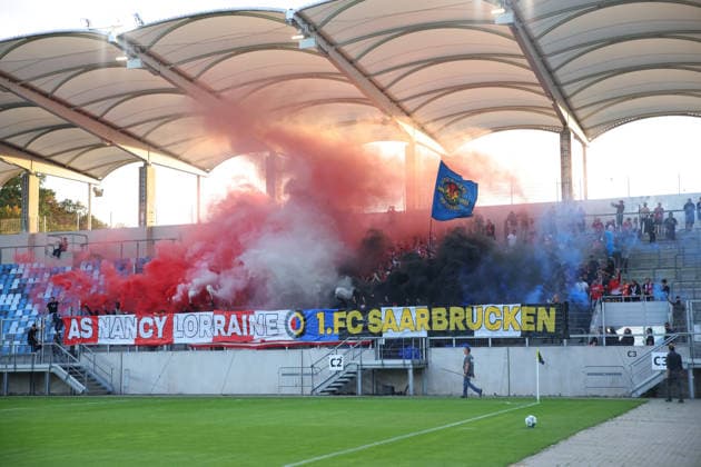 October 2, 2026, Soccer, Men s, Friendly Match, 2026–2027 Season, 1 FC Saarbrücken vs. AS Nancy Lorraine, AS Nancy Lorraine fans set off pyrotechnics, pyro, and smoke bombs at Saarbrücken s Ludwigsparkstadion in Saarland, Germany Copyright: xFabianxKleerx