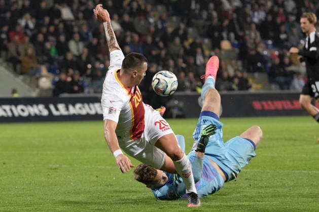 Goalkeeper Rihards Matrevics (23) of Latvia In action against Milutin Osmajic (20) of Montenegro during UEFA Nations League Group C2 football game between Latvia and Montenegro in Riga, Latvia, Fri, Oct. 2, 2026. Riga Latvia Copyright: xRomanxKoksarovx RKV09935.JPG