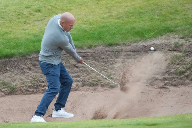 RECORD DATE NOT STATED 2nd October 2026; Kingsbarns Golf Links, Kingsbarns, Scotland; DP World Tour Golf, Alfred Dunhill Links Championship, Day 2; Kelly Slater plays out of a greenside bunker on the 16th hole AlecxBrown