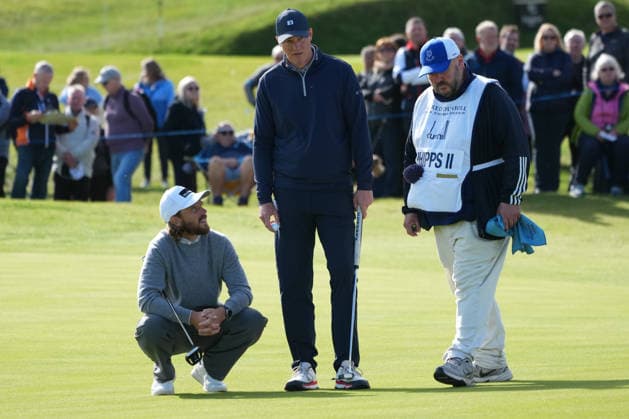 RECORD DATE NOT STATED 2nd October 2026; Kingsbarns Golf Links, Kingsbarns, Scotland; DP World Tour Golf, Alfred Dunhill Links Championship, Day 2; Tommy Fleetwood talks to Ogden Phipps II before his birdie putt on the 15th hole AlecxBrown