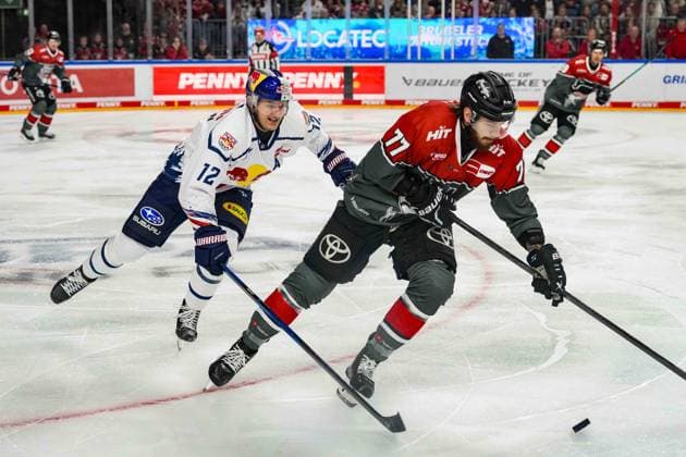 Ice Hockey: DEL Matchday 5—Cologne Sharks vs. EHC Red Bull Munich on October 2, 2026, at the Lanxess Arena in Cologne. Brady Ferguson (Munich), on the left, Ryan Macinnis (Cologne); on the right. In accordance with the regulations of the DEL (German Ice Hockey League), the publication and further use of the footage in electronic media and on devices of any kind during the game is not permitted. xDMx