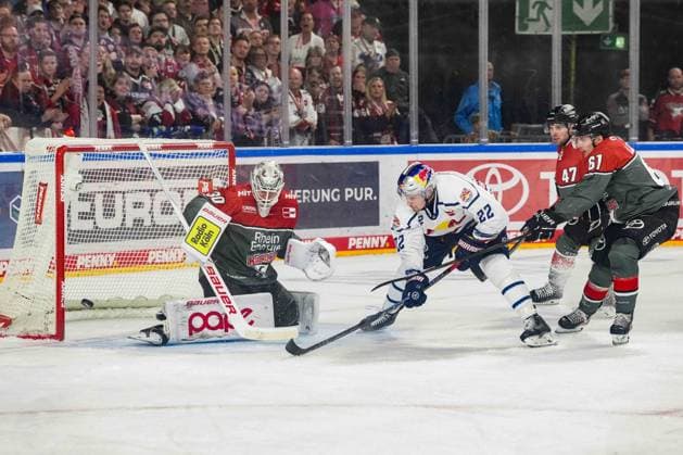 Ice Hockey: Penny DEL, Matchday 5—Cologne Sharks vs. EHC Red Bull Munich on October 2, 2026, at the Lanxess Arena in Cologne. Janne Juvonen (Cologne), left: Ville Pokka (Munich), center: Markus Ljungh (Cologne), right: In accordance with the guidelines of the DEL (German Ice Hockey League), the publication and further use of the images in electronic media and on devices of any kind during the game is not permitted xDMx