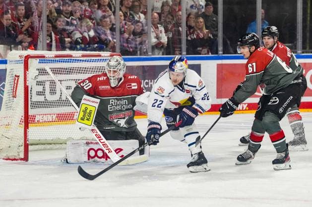 Ice Hockey: Penny DEL, Matchday 5—Cologne Sharks vs. EHC Red Bull Munich on October 2, 2026, at the Lanxess Arena in Cologne. Janne Juvonen (Cologne), left: Ville Pokka (Munich), center: Markus Ljungh (Cologne), right: In accordance with the guidelines of the DEL (German Ice Hockey League), the publication and further use of the images in electronic media and on devices of any kind during the game is not permitted xDMx