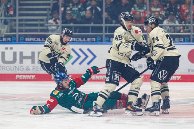 D. J. Busdeker 14, Augsburger Panther; Tyler Morley 86, Grizzlys Wolfsburg; Robert Lynch 49, Grizzlys Wolfsburg; and Lester Lancaster 74, Grizzlys Wolfsburg, during the game between the Augsburger Panther and the Grizzlys Wolfsburg, ice hockey, men s, DEL, 2026–2027, Matchday 5 on October 2, 2026, in Augsburg, Curt Frenzel Stadium, Bavaria, Germany