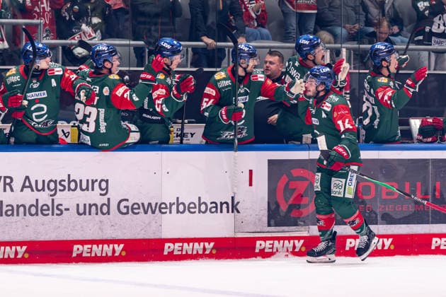 Donald D. J. Busdeker, Augsburger Panther, No. 14, high-fiving teammates on the bench after scoring the goal to make it 3–1 for Germany, Augsburger Panther vs. Grizzlys Wolfsburg, ice hockey, DEL, 2026–2027 season, Matchday 4, October 2, 2026. Photo: HMB Media, Franz Feiner Copyright: HMBxMedia FranzxFeiner