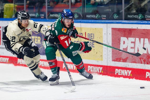 D. J. Busdeker, 14, of the Augsburger Panther, and Madison Bowey, 22, of the Grizzlys Wolfsburg, during the game between the Augsburger Panther and the Grizzlys Wolfsburg, ice hockey, men s, DEL, 2026–2027, Matchday 5 on October 2, 2026, in Augsburg, Curt Frenzel Stadium, Bavaria, Germany