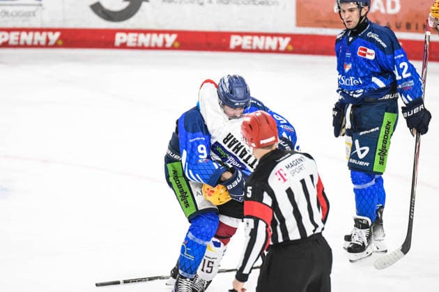Straubing Tigers vs. Pinguins Bremerhaven, Ice Hockey, German Ice Hockey League, Penny DEL, Matchday 5, 2026–2027 Season, October 2, 2026: Stephan Daschner of the Straubing Tigers in a scuffle with Rayan Bettahar of the Pinguins Bremerhaven, Men’s Ice Hockey, German Ice Hockey League, Penny DEL, Matchday 5, 2026–2027 Season on October 2, 2026, at the Eisstadion am Pulverturm, Straubing Tigers (blue) vs. Pinguins Bremerhaven (white)