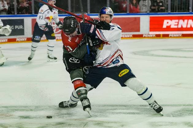 Ice Hockey: Penny DEL, Matchday 5—Cologne Sharks vs. EHC Red Bull Munich on October 2, 2026, at the Lanxess Arena in Cologne. Daniel Fischbuch, Cologne, left: Patrick Hager (Munich), right: In accordance with the regulations of the DEL (German Ice Hockey League), the publication and further use of the images in electronic media and on devices of any kind during the game is not permitted xDMx