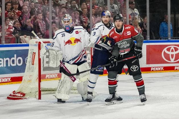 Ice Hockey: Penny DEL, Matchday 5—Cologne Sharks vs. EHC Red Bull Munich on October 2, 2026, at the Lanxess Arena in Cologne. Mathias Niederberger (Munich), left: Lukas Klok (Munich), center: Patrick Russell (Cologne), right: In accordance with the guidelines of the DEL (German Ice Hockey League), the publication and further use of the footage in electronic media and on devices of any kind during the game is not permitted xDMx