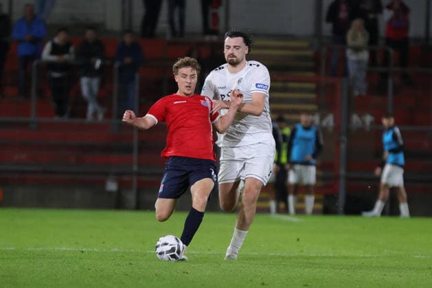 October 2, 2026, Soccer, Men s, Bavarian Regional League, 2026–2027 Season, Matchday 12: SpVgg Unterhaching vs. FC Schweinfurt 05. From left: Moritz Müller (SpVgg Unterhaching, No. 24) and Kevin Frisorger (FC Schweinfurt 05, No. 04). Unterhaching, Uhlsport Park, Unterhaching, Bavaria, Germany