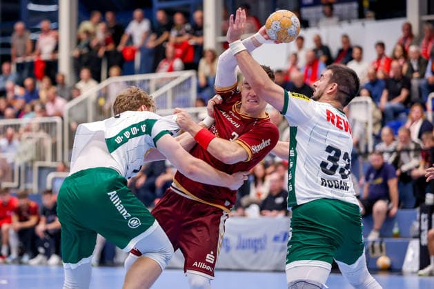 October 2, 2026, Matchday 6 of the 2nd Handball Bundesliga: TuSEM Essen vs. SC DHfK Leipzig; Max Neuhaus (TuSEM Essen) 37 in a one-on-one battle against Luka Rogan (SC DHfK Leipzig) 33 and Tim Hertzfeld (SC DHfK Leipzig) 72; North Rhine-Westphalia, Germany