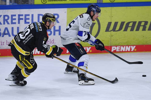 Ice Hockey: Penny DEL, Matchday 5—Krefeld Pinguine vs. ERC Ingolstadt on October 2, 2026, at the Yayla Arena in Krefeld. Adam Payerl (Krefeld), on the left, Alex Breton of Ingolstadt; on the right. In accordance with the regulations of the DEL (German Ice Hockey League), the publication and further use of the footage in electronic media and on devices of any kind during the game is not permitted. xRx