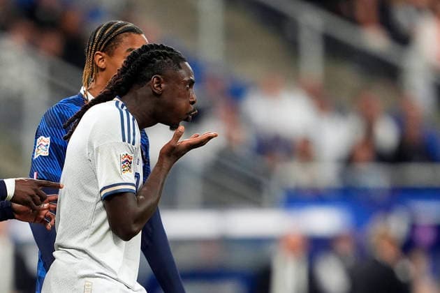 Italy s Moise Kean blows a kiss to the sent-off player. during the UEFA Nations League soccer match between France and Italy at the Stade de France in Saint-Denis, Paris, France - October 2, 2026. - Soccer  Copyright: xFabioxFerrari LaPressex