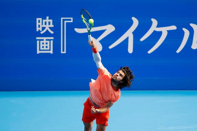 October 3, 2026, Tokyo, Japan: Carlos Alcaraz (Spain) serves against Matteo Arnaldi (Italy) during their Round of 16 match at the Kinoshita Group Japan Open Tennis Championships at Ariake Colosseum in Tokyo. The tournament runs from September 29 to October 6. Alcaraz won 7-6(6), 6-1. Tokyo Japan - ZUMAm191 20261003_aap_m191_039 Copyright: xRodrigoxReyesxMarinx