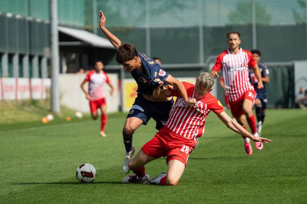October 3, 2026, xjyhynx, soccer exhibition match, SC Freiburg vs. FC Lucerne, from left: Lars Villiger (27), FC Lucerne in a tackle with Matthias Ginter (28), SC Freiburg, Freiburg