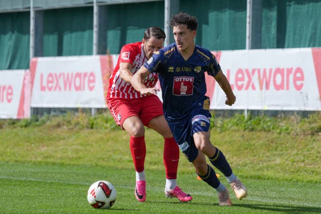 Demir Xhemalija of FC Luzern, 34, in a tackle with Christian Günter of SC Freiburg, 30, Germany, soccer, friendly match, SC Freiburg vs. FC Luzern, October 3, 2026, Europa-Park Stadium, Training Field, Freiburg, Freiburg, Europa-Park Stadium, Training Field, Baden-Württemberg, Germany Copyright: xArnexAmbergx