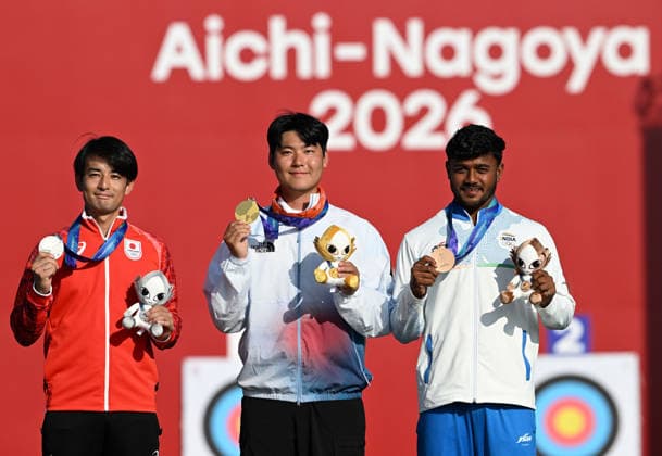(261003) -- OKAZAKI, Oct. 3, 2026 -- Gold medalist Lee Wooseok (C) of South Korea, silver medalist Nakanishi Junya (L) of Japan and bronze medalist Neeraj Chauhan of India pose for photos during the awarding ceremony for the Recurve Men s Individual of Archery at the 20th Asian Games Aichi-Nagoya 2026 in Okazaki of Aichi Prefecture, Japan, Oct. 3, 2026. ) (SP)JAPAN-OKAZAKI-ASIAN GAMES-ARCHERY-RECURVE MEN S INDIVIDUAL-GOLD MEDAL MATCH YuxYang 
