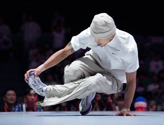(261003) -- TOKONAME, Oct. 3, 2026 -- South Korea s Kim Hongyul competes during the B-Boys final match of Breaking between Japan s Nakarai Shigeyuki and South Korea s Kim Hongyul at the 20th Asian Games Aichi-Nagoya 2026 in Tokoname of Aichi Prefecture, Japan, Oct. 3, 2026. ) (SP)JAPAN-TOKONAME-ASIAN GAMES-BREAKING-B-BOYS CheongxKamxKa 